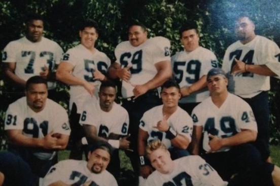 Larry Allen with teammates 