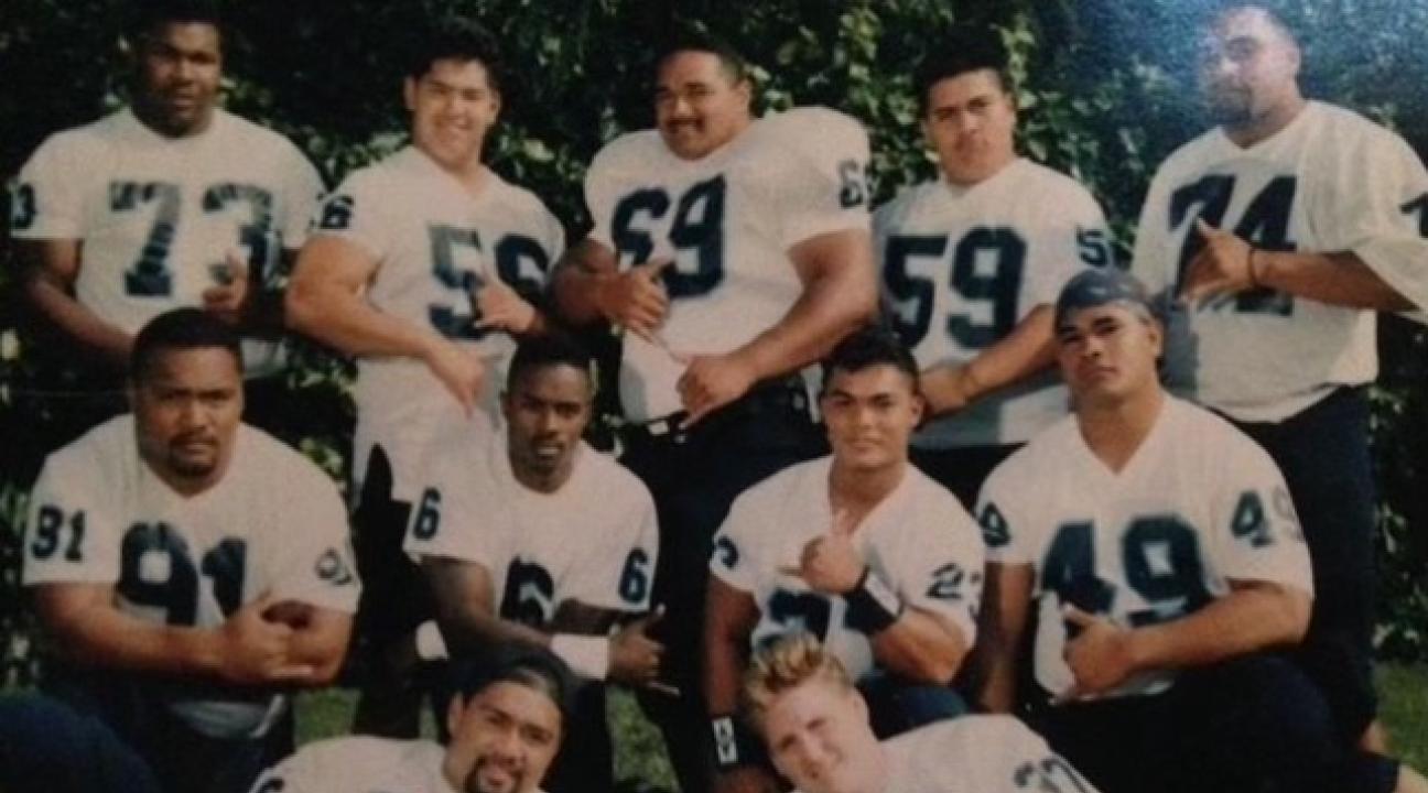 Larry Allen with teammates 