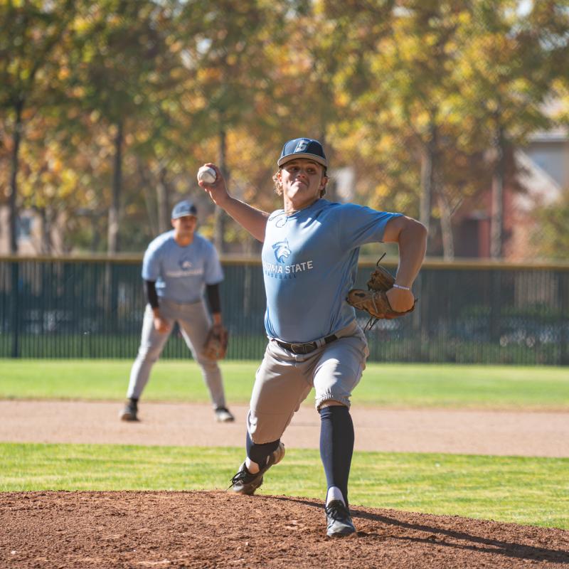 Student throwing a baseball