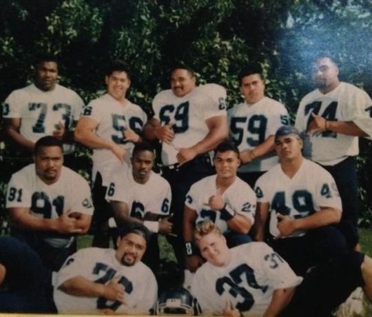 Larry Allen with teammates 