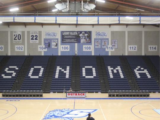 Wolves den with bleacher showing the word Sonoma