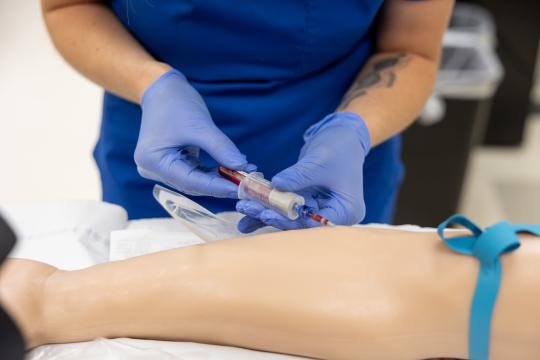 Nurse giving IV