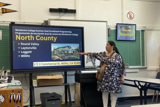 Otaka Redhawk, Pathway Advisor, presenting during orientation for Round Valley High School students before summer dual enrollment program.