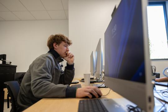 student on computer