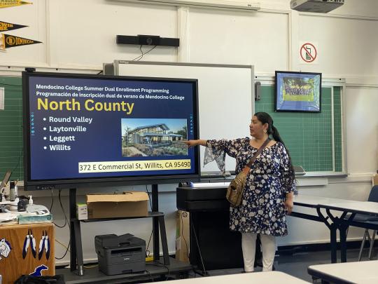Otaka Redhawk, Pathway Advisor, presenting during orientation for Round Valley High School students before summer dual enrollment program.